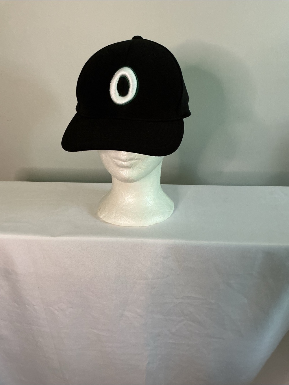 Black Baseball Cap with White 'O' Emblem